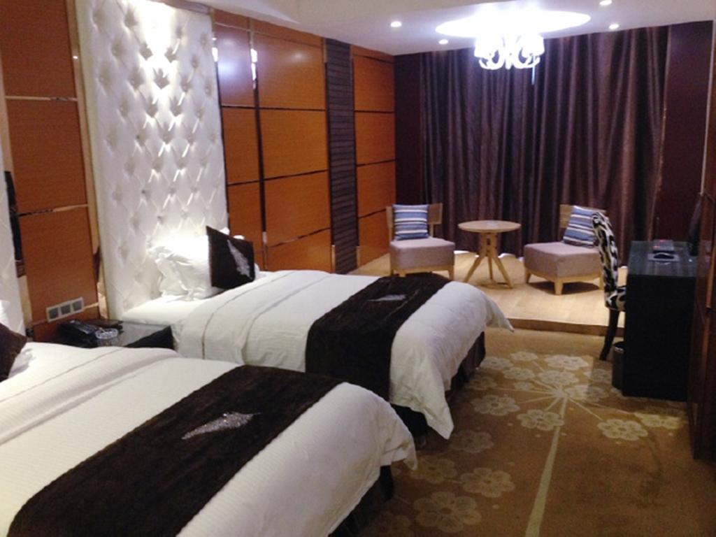 Tianguo Times Hotel Foshan Room photo