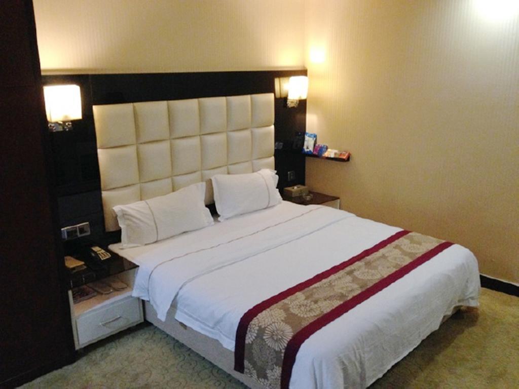 Tianguo Times Hotel Foshan Room photo