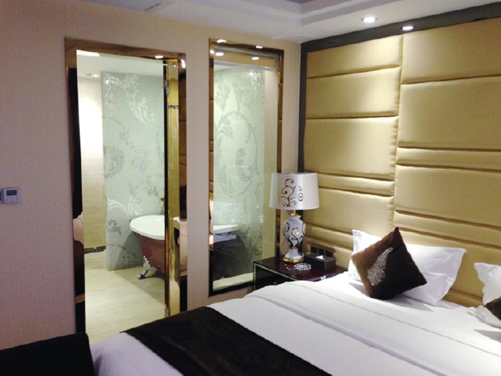 Tianguo Times Hotel Foshan Room photo